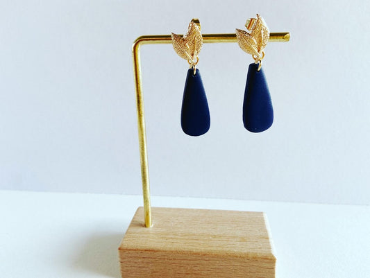 Marine blue with 14k gold plated leaves.